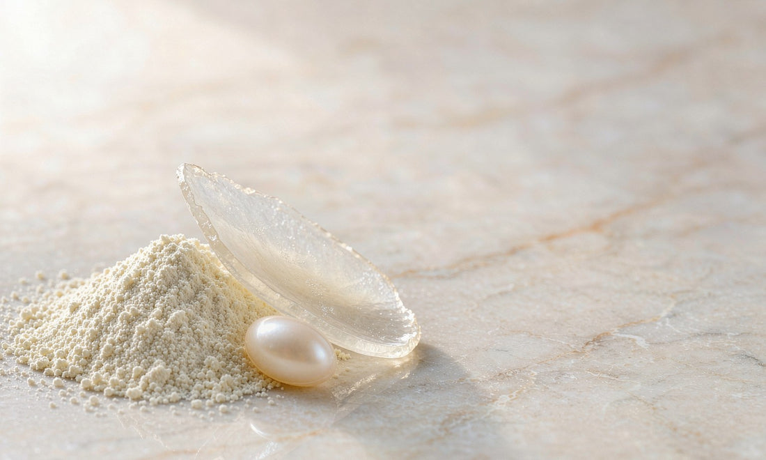Macro close-up of fine collagen powder a translucent flake and a smooth pearl capsule on marble