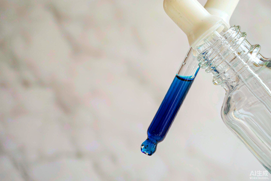 Deep blue methylene blue liquid drawn into a glass dropper over a pale marble counter